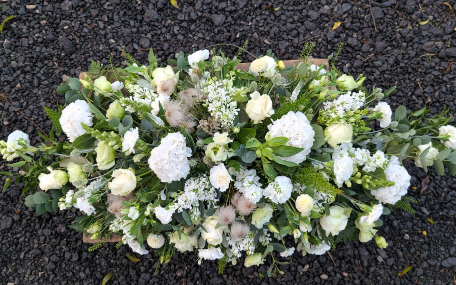 flora fauna funeral flower arrangement 7