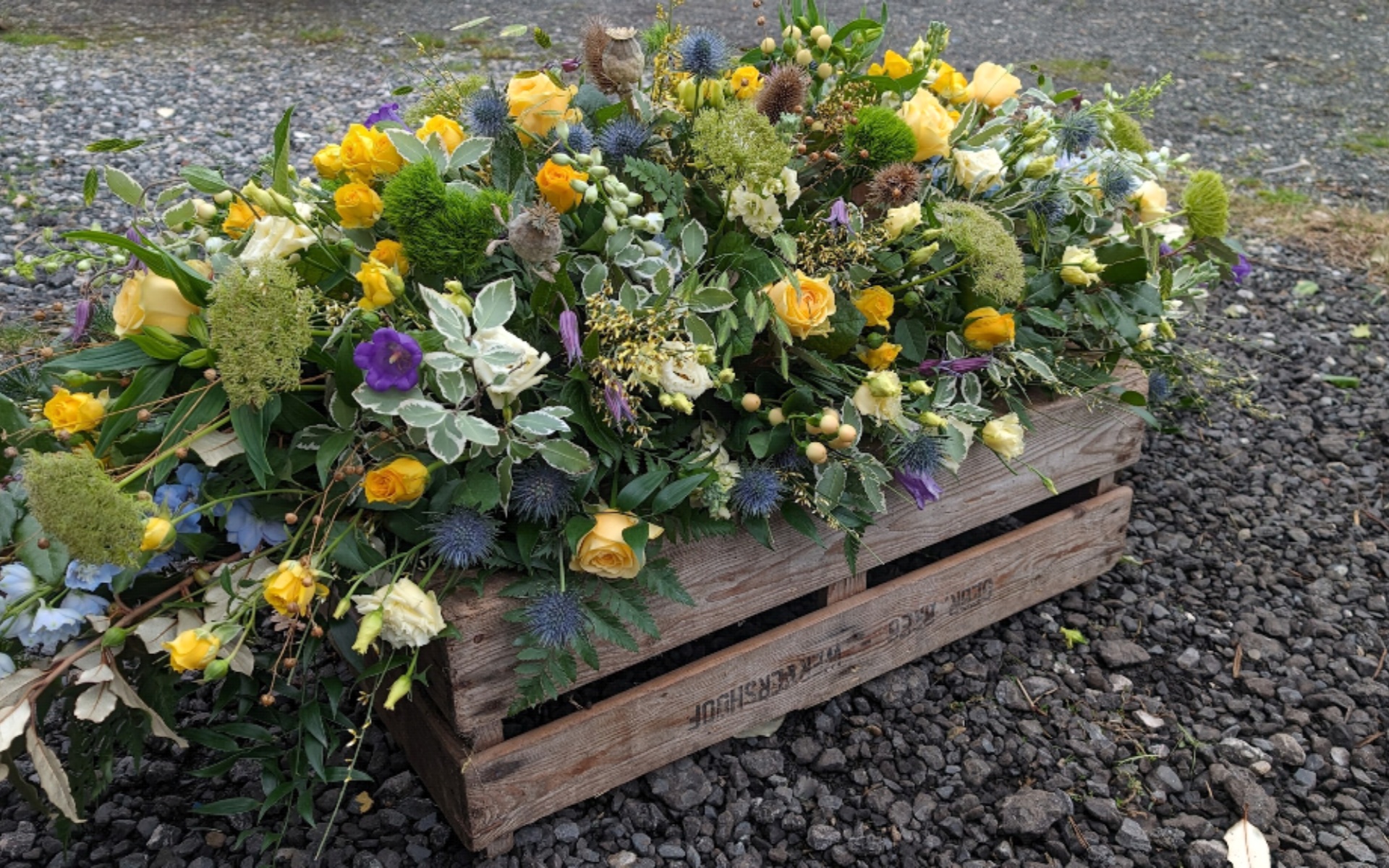 flora fauna funeral flower arrangement 8