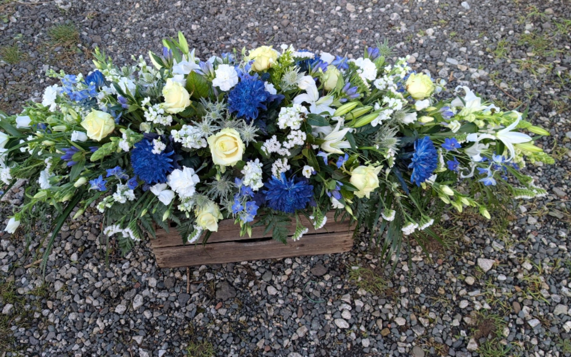 flora fauna funeral flower arrangement 11